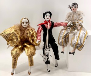 lot 122 image: Set of 3 Porcelain Pierrot and Harlequin Clown Dolls with Metallic Outfits