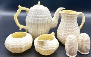 lot 153 image: Belleek Limpet Pattern Porcelain Tea Set with Creamer, Sugar, and Shakers