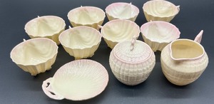 lot 157 image: Belleek Ireland Limpet Pattern Creamer, Sugar Bowl with Lid, and 8 Neptune shell Footed Bowls
