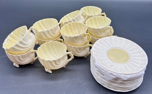 lot 162 image: Belleek Neptune Shell Pattern Tea Cups and Limpet Pattern Saucers Set of 13 Cups and 13 Saucers