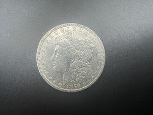 lot 5 image: 1879 Morgan Silver Dollar
