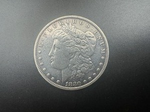 lot 8 image: 1880 Morgan Silver Dollar