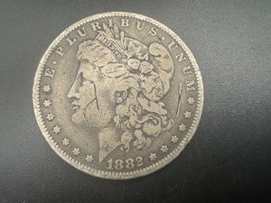 lot 11 image: 1882-O Morgan Silver Dollar