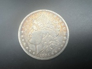 lot 13 image: 1884 Morgan Silver Dollar
