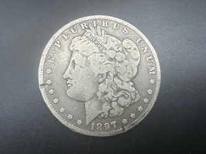 lot 18 image: 1897-O Morgan Silver Dollar