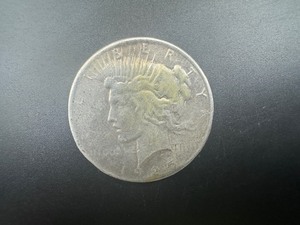 lot 57 image: 1925 Peace Silver Dollar