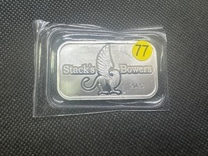 lot 77 image: 2023 BU Stacks & Bowers 1 Oz. Silver Bar