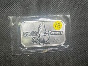 lot 78 image: 2023 BU Stacks & Bowers 1 Oz. Silver Bar