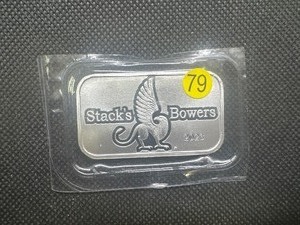 lot 79 image: 2023 BU Stacks & Bowers 1 Oz. Silver Bar