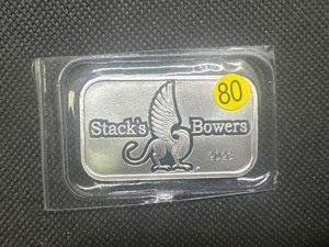 lot 80 image: 2023 BU Stacks & Bowers 1 Oz. Silver Bar