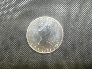 lot 86 image: 1989 Brilliant Uncirculated .9999 1 Oz. Silver Canada Maple Leaf