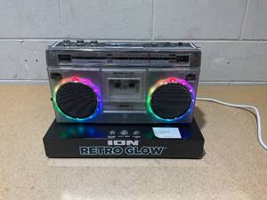 lot 223 image: ION Retro Glow Bluetooth CassetteRadio Boom Box with LED Lights, Translucent, RETROGLOWXUS DEMO MODEL
