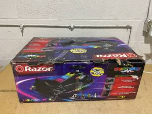 lot 183 image: Crazy Cart Shift Lightshow by Razor - 12V Electric Drifting Go-Kart for Kids Ages 6, up to 8 mph