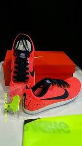 lot 173 image: Nikes Zoom Rival D-10 Shoes Mens Size 12 & Nikes Zoom 400 Mens Size 15 MSRP $175