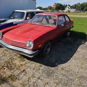 lot 17 image: Pretty Rare Rust Free Original 1976 Vega GT, Garage Find, 4 Cylinder, 4 Speed, Red on Red Plain, 39,388 Actual Original Miles