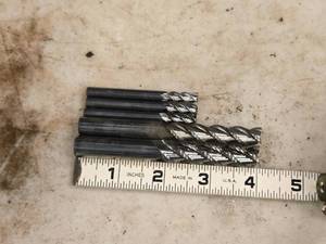 lot 907 image: Lot of (5) 3 Flute Carbide End Mill - 12 (x1), 716 (x1), 14 (x3)