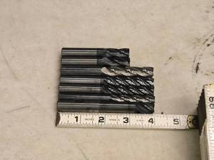 lot 915 image: Lot of (7) 4 Flute Carbide End Mill - 716 (x2), 12 (x4), 38 (x1)