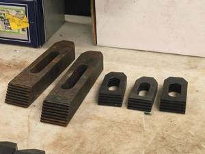 lot 939 image: Lot of (5) Serated Step Strap Clamp - (2) 6 long, (3) 2-12 long