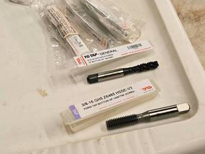 lot 818 image: Lot of (5) Taps - 516-18 (x4), 38-16 (x1) (in original packaging)