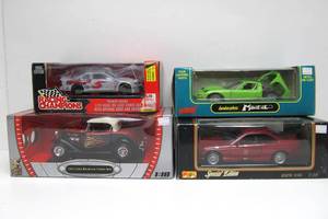 lot 27 image: 4 Mint in Box Diecast Metal Vehicles