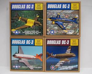 lot 38 image: 4 New in Box Diecast Metal Douglas DC-3 Airplanes