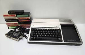 lot 166 image: Vintage TI-99 Computer  Video Game System wGames