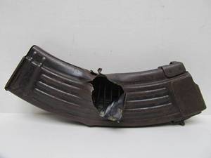 lot 213 image: Old Vintage Military Used Machine Gun MagazineClip wBattlefield Damage