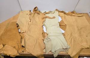 lot 259 image: Large Lot of Genuine Tanned Leather Sections