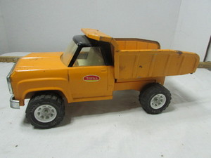 lot 140 image: Vintage Tonka Orange Dump Truck 1970s