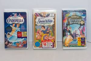 lot 79 image: Vintage Walt Disney Masterpiece Collection VHS  Sealed Set - Cinderella, Sleeping Beauty, and Snow White