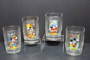 lot 113 image: Mickey Mouse Disney World 2000 McDonalds Celebration Glasses  Set of 4