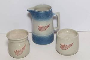 lot 149 image: Red Wing Stoneware  Two Wax Warmers & United Defense 1997 Pitcher