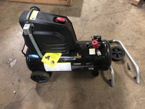lot 36 image: Husky 8 Gal. 150 PSI Portable Electric Oil-Free Horizontal Hotdog Air Compressor with Rubber Wheels and 1-Quick Coupler Broken  Customer Returns See Pictures