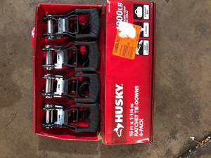 lot 58 image: Husky 16 ft. 1.25 in. Ratchet Tie-Down Straps with S-Hook (4-Pack)  Customer Returns See Pictures