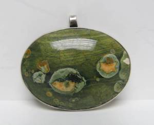 lot 14 image: Lovely Signed Sterling Silver & Rainforest Rhyolite Oval Pendant - Signed Murphy