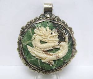 lot 35 image: Large Old Vintage Oriental Carved Bone on Green Stone Dragon Pendant