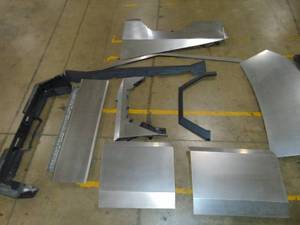 lot 2 image: Tesla Cybertruck Stainless Steel Body Parts