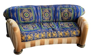 lot 4 image: J. Coro Collection Upholstered Sofa with Versace Pattern Fabric and Ornate Wooden Accents