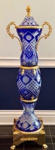 lot 7 image: Large Ornate Cobalt Blue Cut Glass Urn with Gold Handles and Base