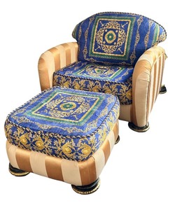 lot 45 image: Large Patterned Armchair with Matching Ottoman and Gold Accents, Versace Fabric