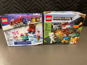 lot 3 image: LEGO Minecraft 21162 Taiga Adventure and LEGO Movie 70822 Unikittys Sweetest Friends Set
