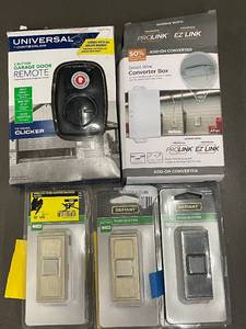 lot 57 image: Lot of Garage Door Remote, Converter Box, and Defiant Push Button Switches