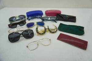 lot 104 image: Sunglasses and Cases Lot