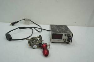 lot 114 image: Tattoo Gun with Skull Piece