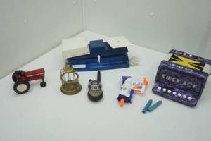 lot 172 image: Delta Educational Scale, Diecast International Tractor, Kids Accordion and more