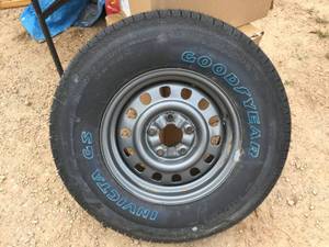 lot 359 image: Like New Goodyear Invicta GS - P23575R15 Tire on Rim