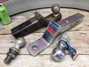 lot 144 image: (2) 2 Trailer Hitches with 2 & 2 516 Balls