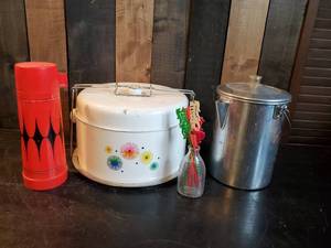 lot 6 image: Vintage Kitchen Items, Aladdin Thermos, Vibrant Cake tin, Vintage Stir Sticks and more