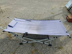 lot 42 image: Folding Portable Cot in solid condition