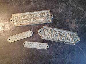lot 98 image: Fun Snarky Heavy duty Metal Door emblems